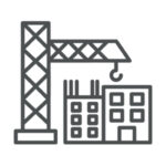 Une grue au-dessus d’un bâtiment en construction, représentant le développement immobilier.